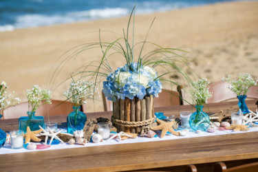Coordinating Reception Table Decor Theme with added Florals